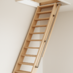 A wooden loft ladder extending into a ceiling hatch in a modern home interior